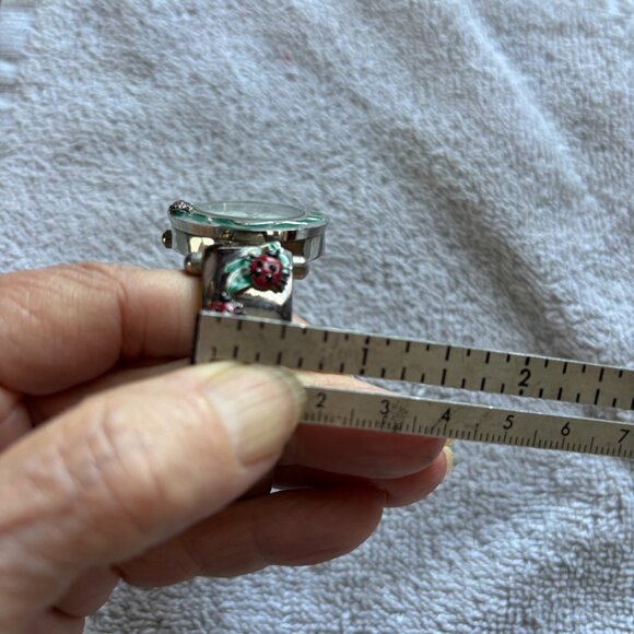 Green and Silver Ladybug Cuff Watch with Intricate Design - Picture 10 of 11